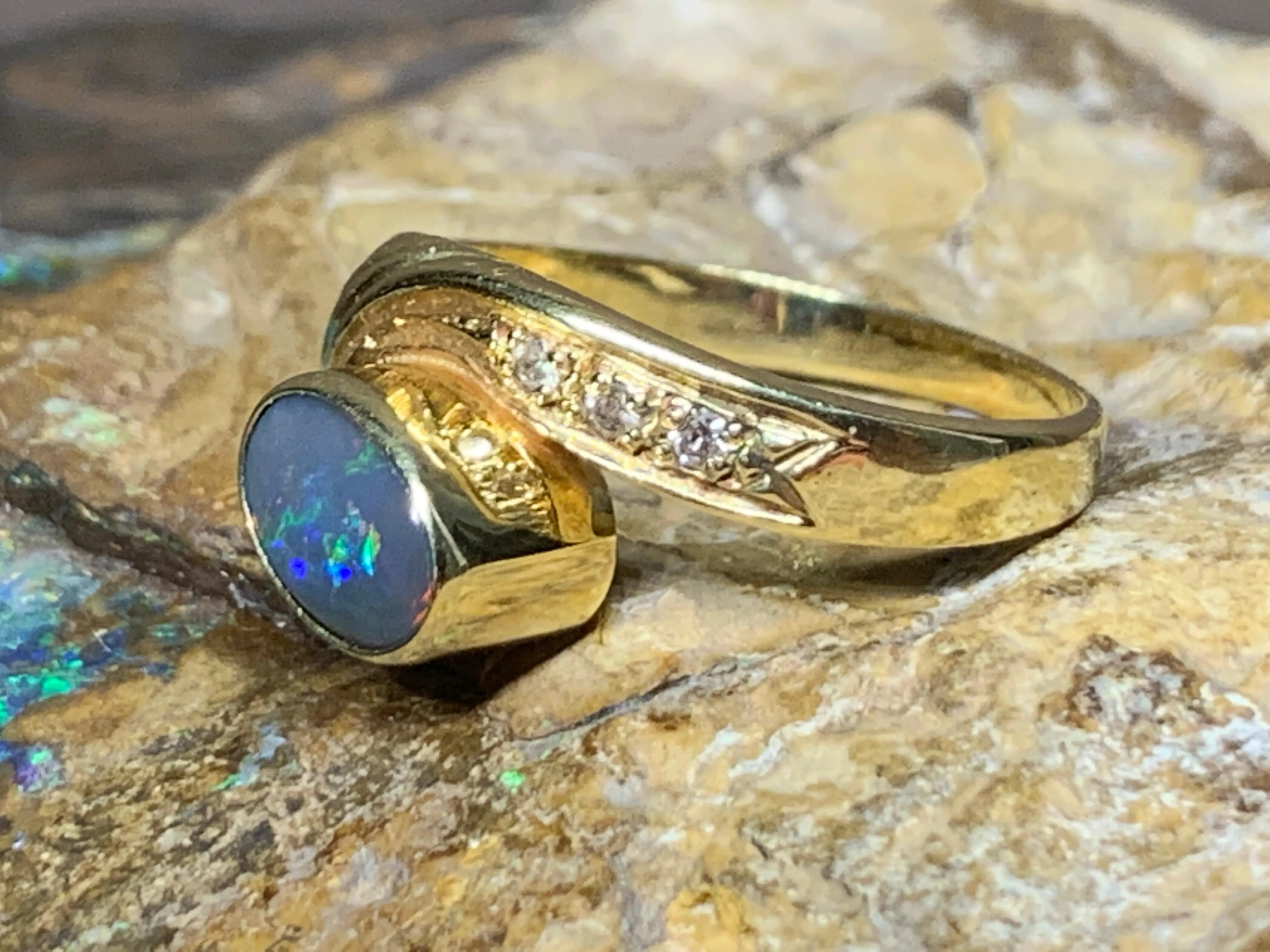 18KT Yellow Gold Black Opal and Diamond ring