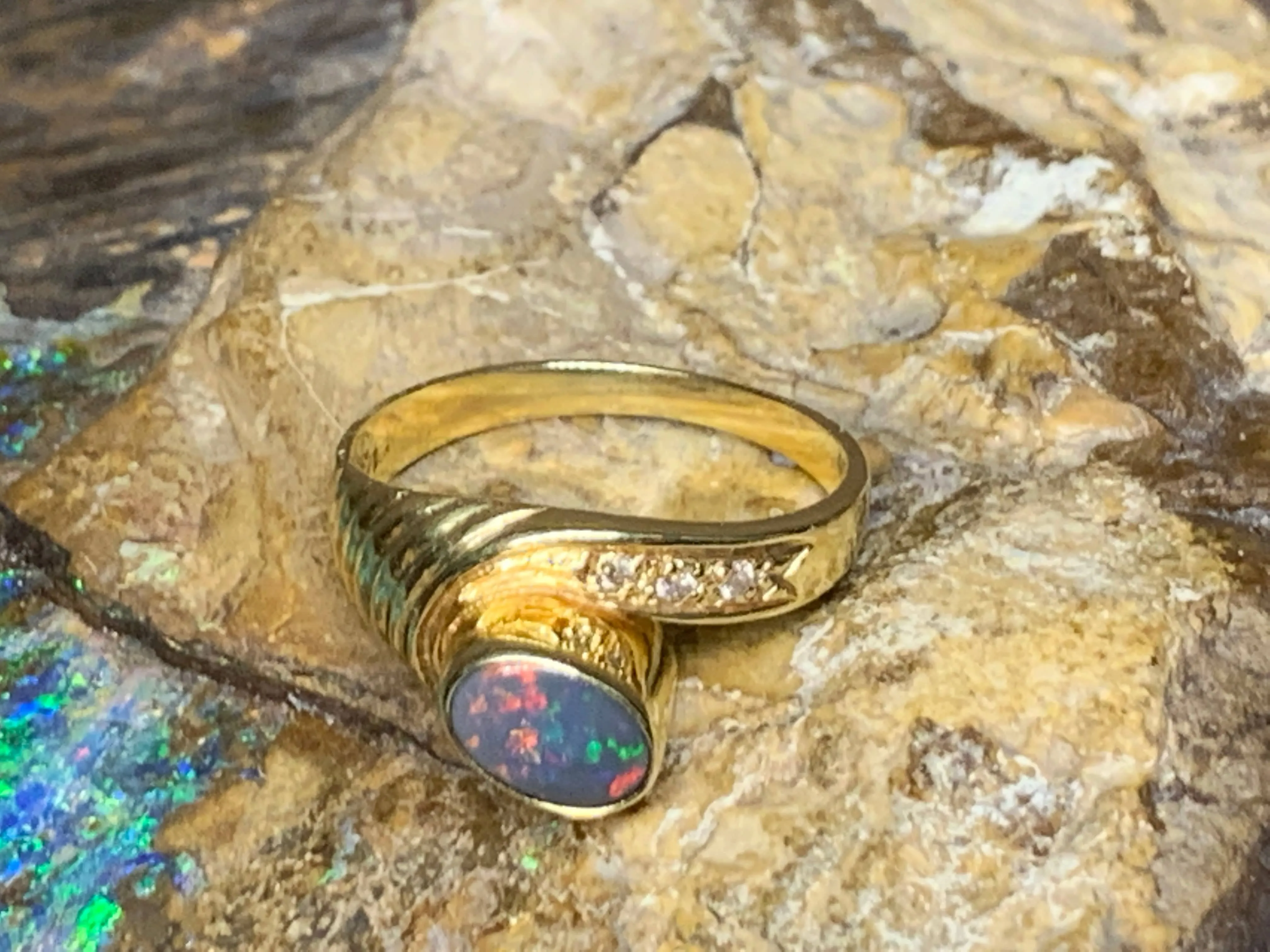 18KT Yellow Gold Black Opal and Diamond ring
