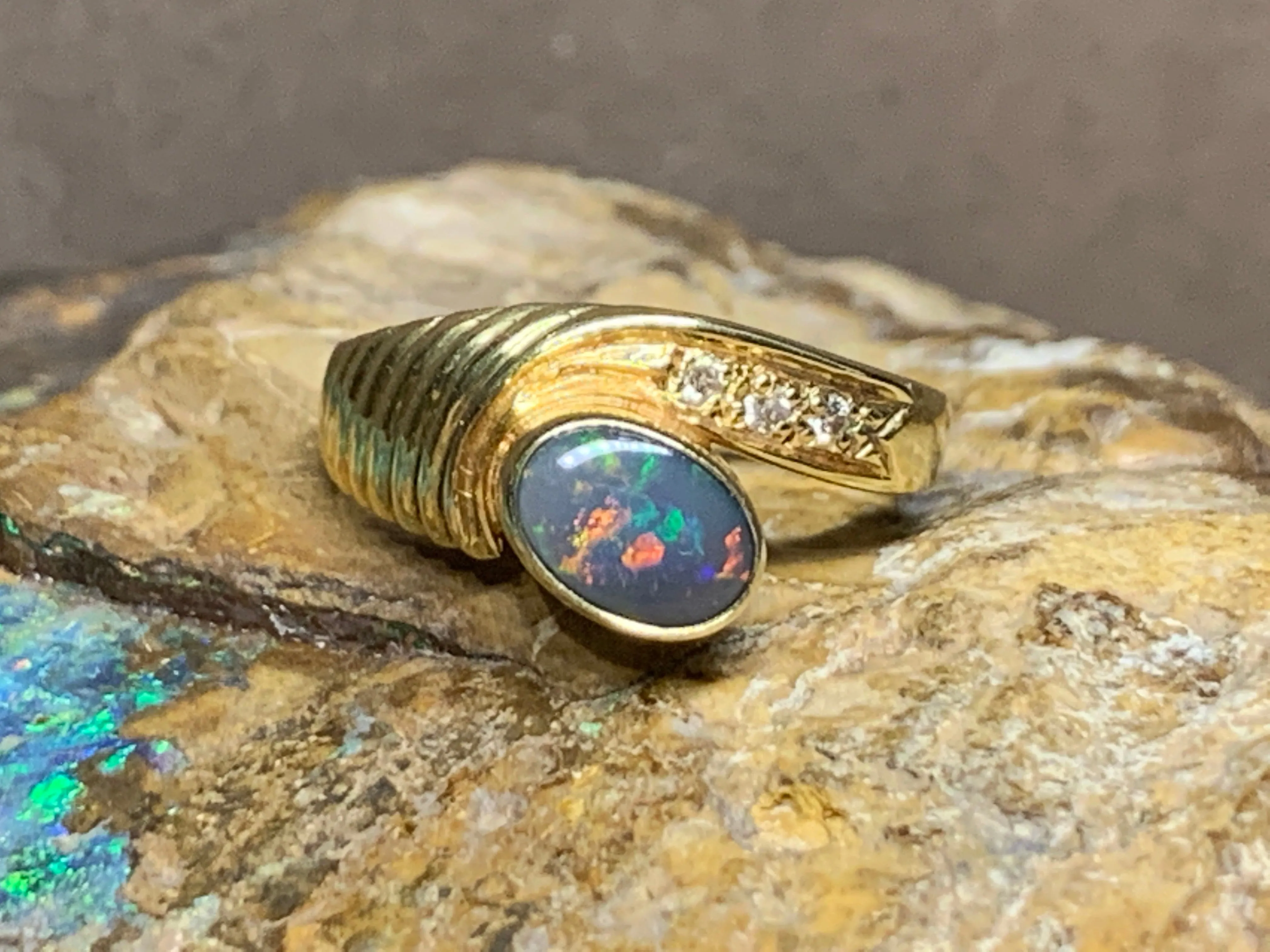18KT Yellow Gold Black Opal and Diamond ring