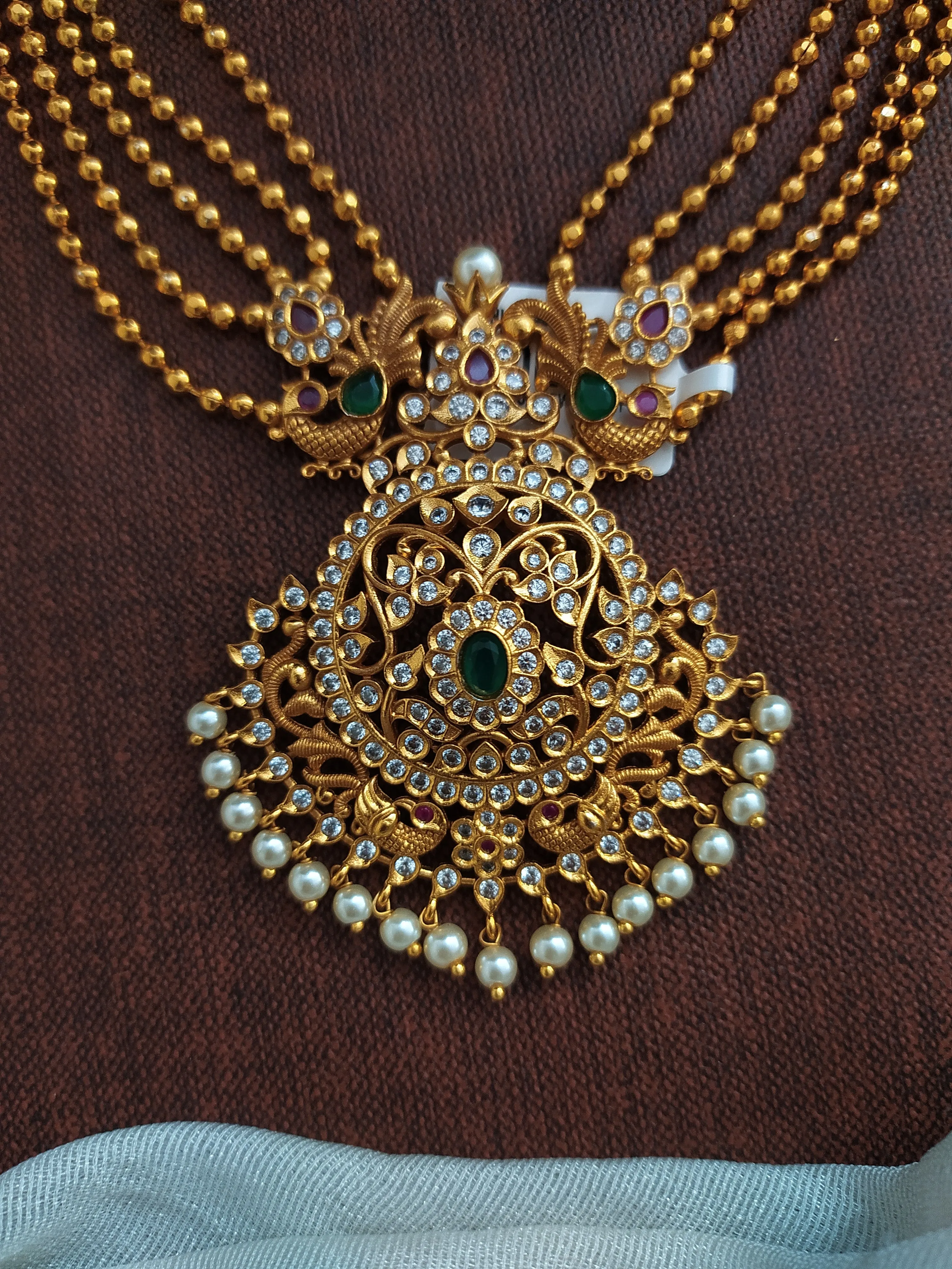 Gold-Plated Layered Necklace Set with Emerald and Ruby Accents