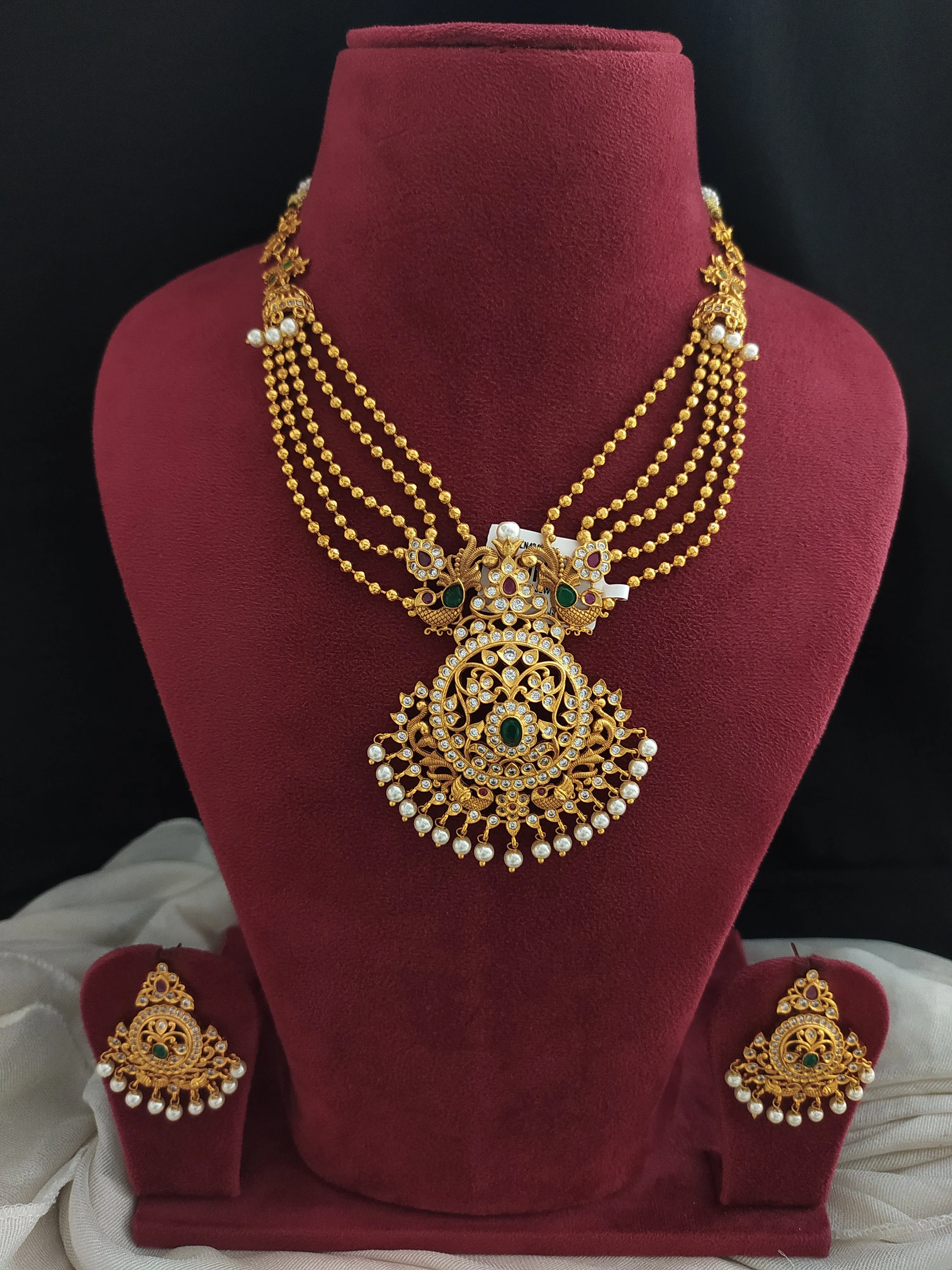 Gold-Plated Layered Necklace Set with Emerald and Ruby Accents