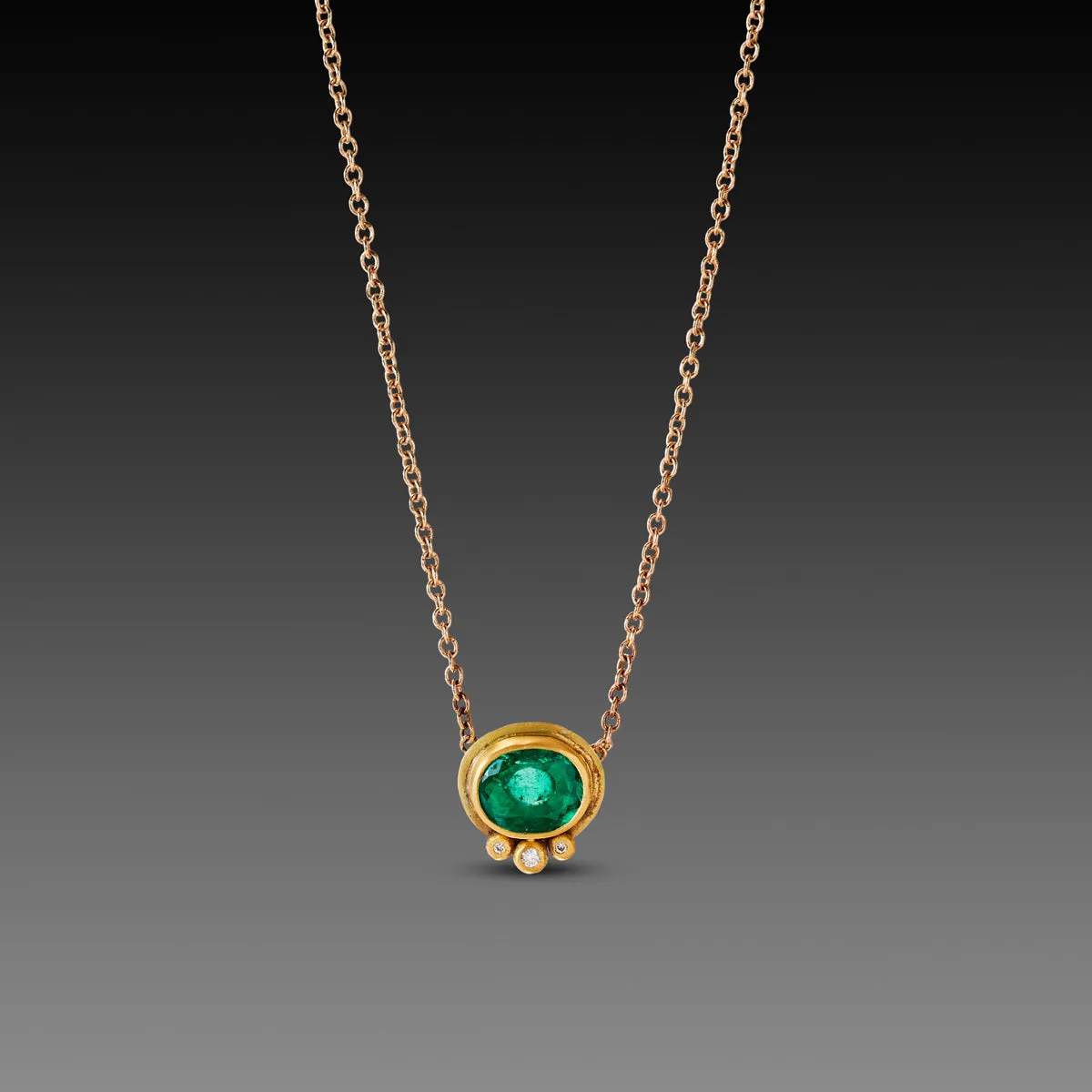 Oval Emerald Necklace with Diamond Trio